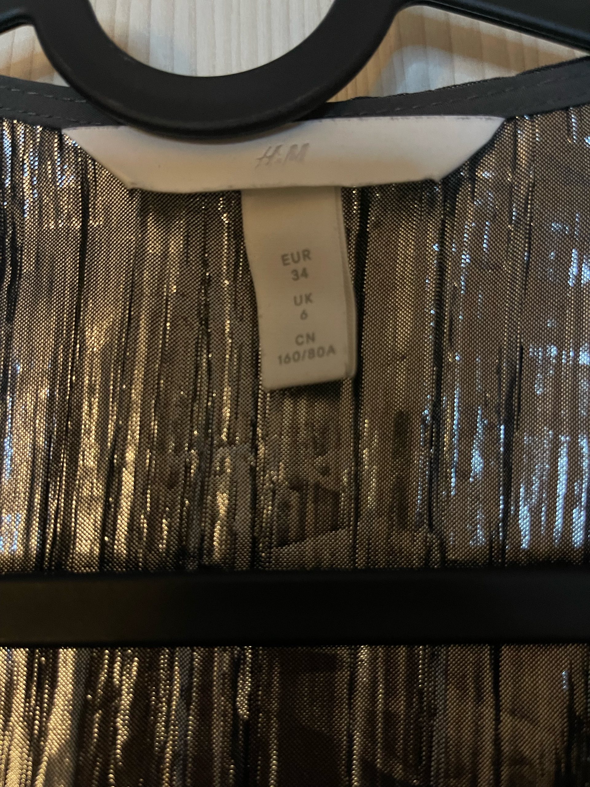 H&M svjetlucavi kombinezon 1